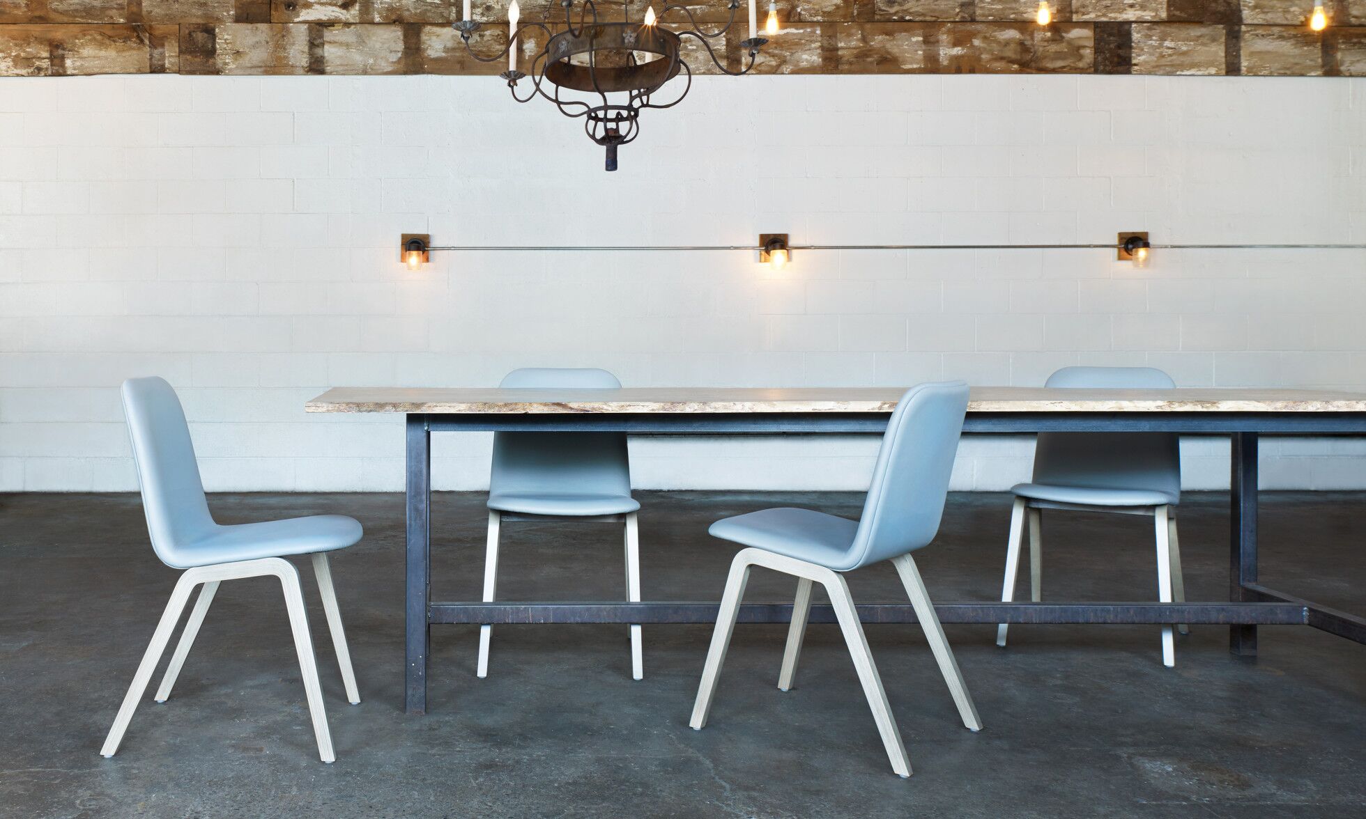 source international mojo chairs in blue around dining table